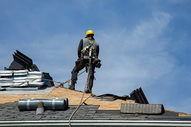 Professional Roofing technician working in Montchanin, DE